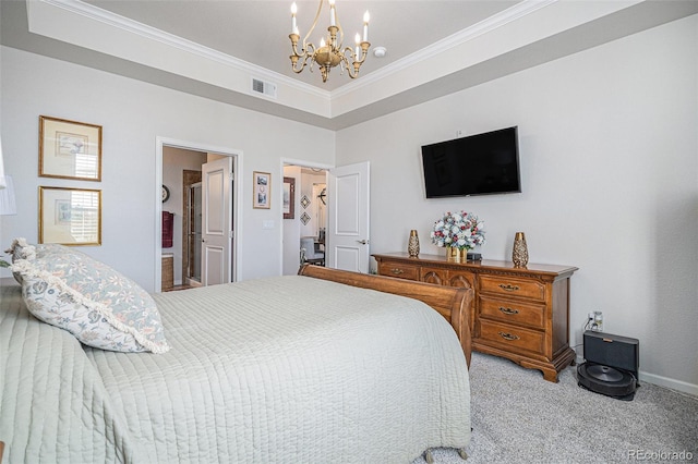 carpeted bedroom with a notable chandelier, crown molding, and connected bathroom