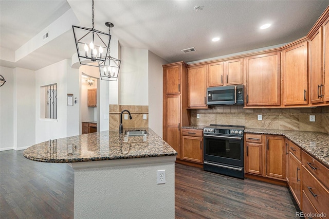 7865 Vallagio Ln Unit 308, Englewood, CO 80112 - kitchen featuring range with electric stovetop, stainless steel microwave, dark wood-style flooring, a chandelier, and a peninsula