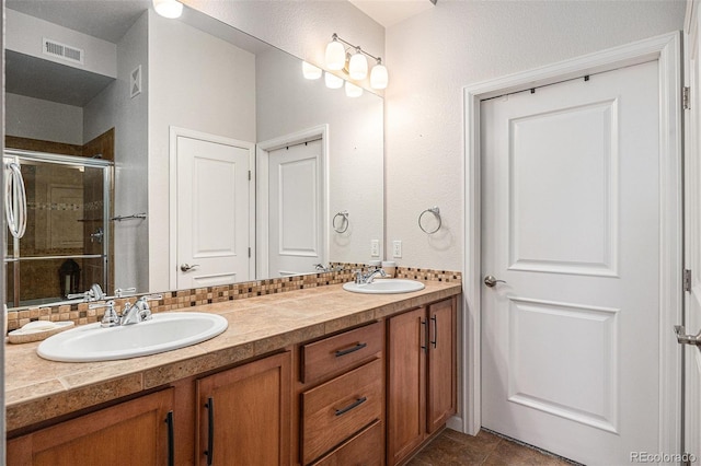 7865 Vallagio Ln Unit 308, Englewood, CO 80112 - bathroom with double vanity and a shower stall