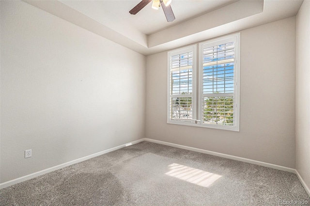 7865 Vallagio Ln Unit 308, Englewood, CO 80112 - carpeted spare room featuring baseboards and a ceiling fan