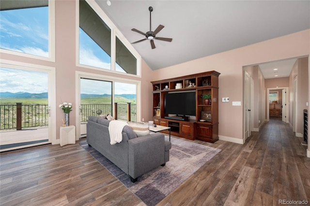 251 Grand Elk Way, Granby, CO 80446 - living room with wood finished floors, ceiling fan, high vaulted ceiling, and a mountain view