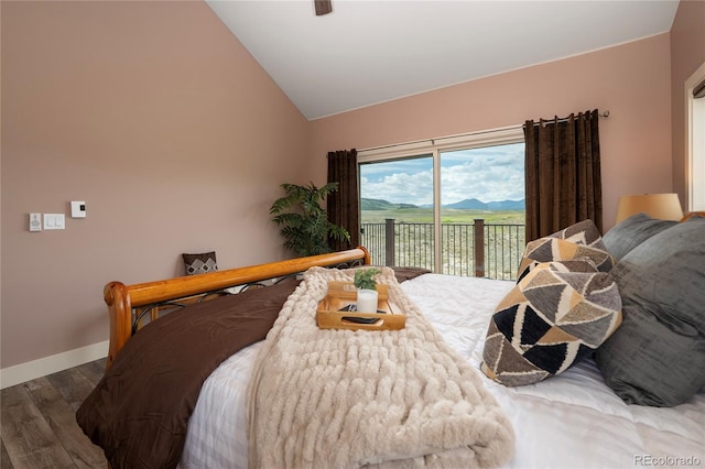 251 Grand Elk Way, Granby, CO 80446 - bedroom with wood finished floors, access to exterior, lofted ceiling, and a ceiling fan