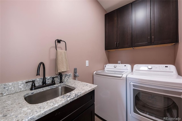 251 Grand Elk Way, Granby, CO 80446 - laundry area with cabinet space and washer and dryer