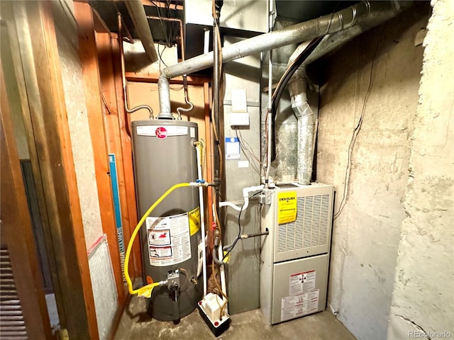 utility room featuring water heater