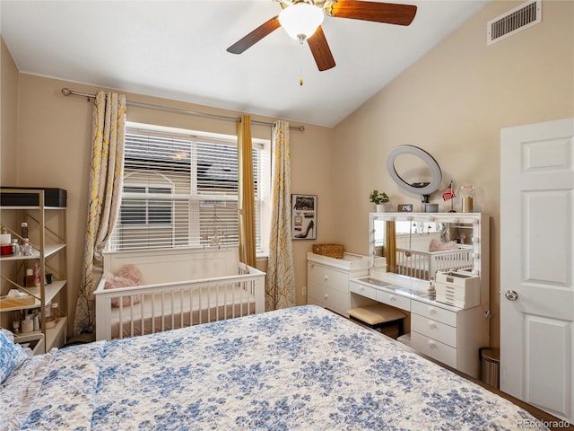 bedroom featuring lofted ceiling and ceiling fan