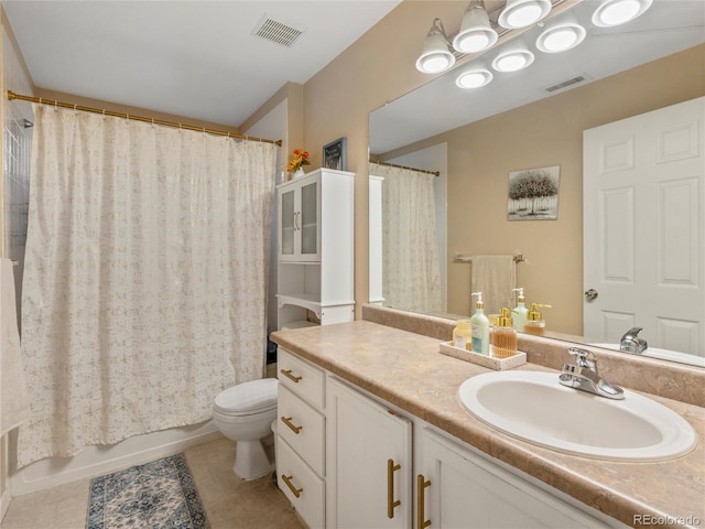bathroom featuring tile patterned flooring, vanity, toilet, and shower / bath combo with shower curtain