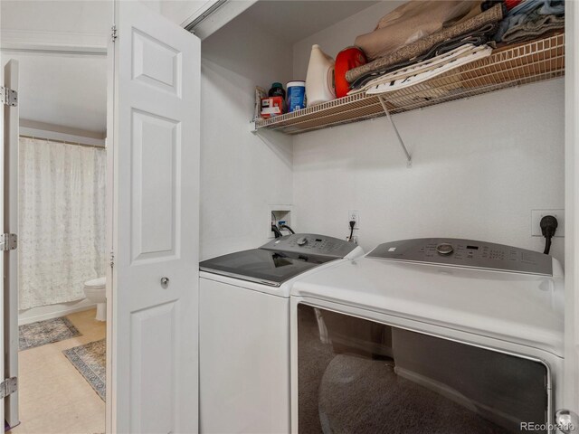 laundry area with washer and clothes dryer