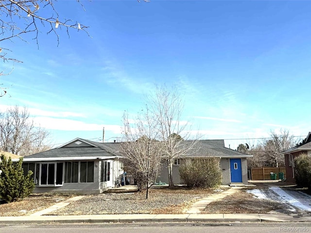 384 Dayton St, Aurora, CO 80010 - ranch-style home featuring a sunroom