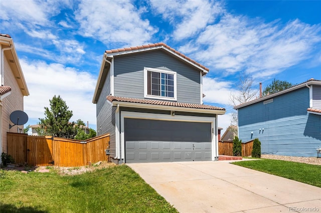 4184 Netherland St, Denver, CO 80249 - traditional-style home with a tile roof, driveway, and an attached garage