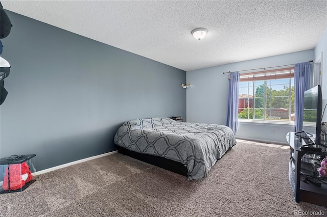 4184 Netherland St, Denver, CO 80249 - carpeted bedroom with a textured ceiling and baseboards