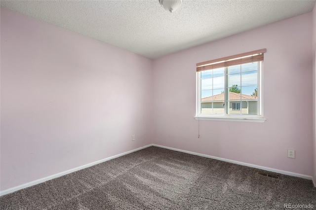 4184 Netherland St, Denver, CO 80249 - unfurnished room featuring carpet flooring, a textured ceiling, and baseboards