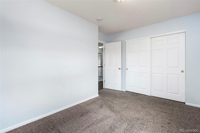 4184 Netherland St, Denver, CO 80249 - unfurnished bedroom with carpet, baseboards, and a closet