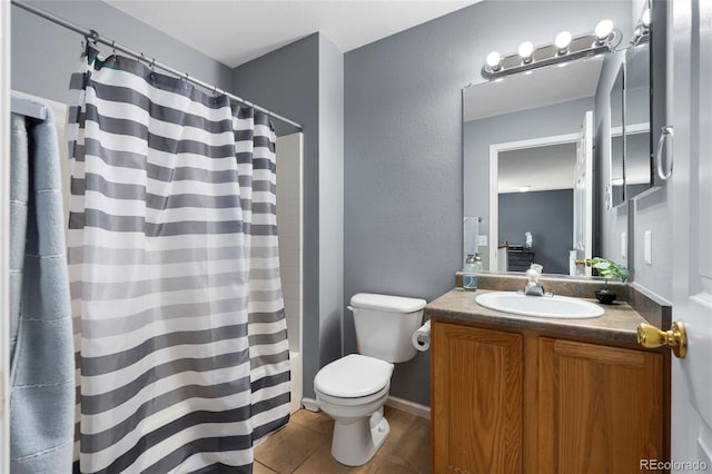 4184 Netherland St, Denver, CO 80249 - full bath featuring toilet, vanity, tile patterned flooring, a shower with curtain, and a textured wall