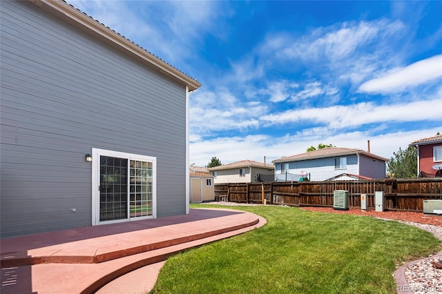 4184 Netherland St, Denver, CO 80249 - view of yard with a patio area, central AC, and a residential view