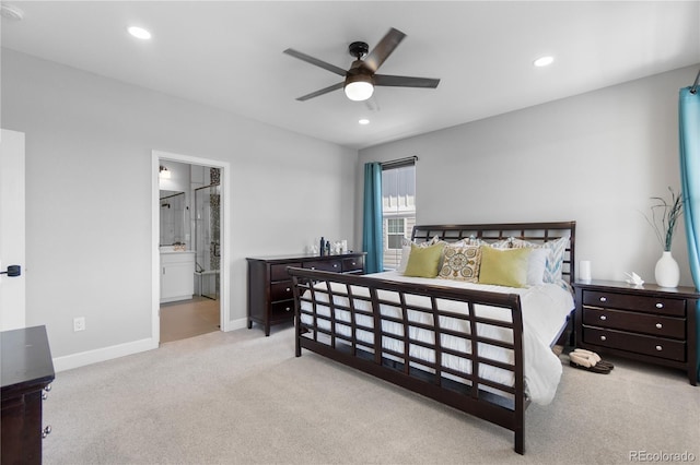 bedroom with carpet floors, recessed lighting, baseboards, ensuite bath, and ceiling fan