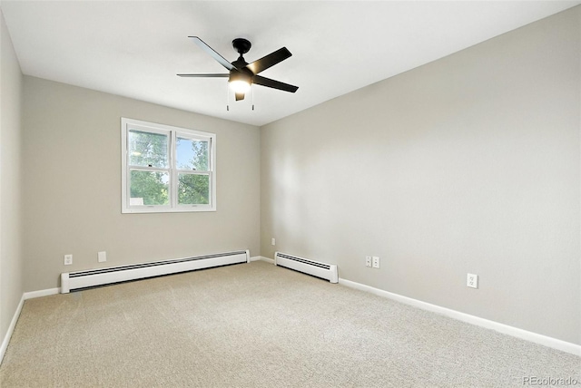 1092 E 16th Ave, Broomfield, CO 80020 - spare room featuring a baseboard radiator, light colored carpet, and a ceiling fan