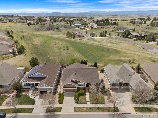 birds eye view of property with a residential view