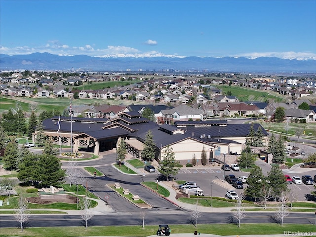 birds eye view of property featuring a mountain view and a residential view