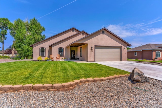 ranch-style home with a garage and a front lawn