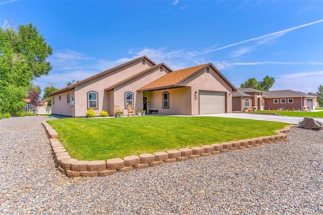 single story home featuring a garage and a front lawn