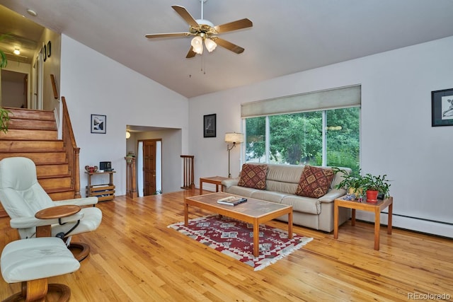 living room with high vaulted ceiling, light hardwood / wood-style floors, and ceiling fan