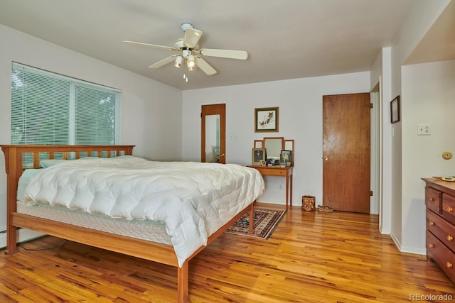 bedroom featuring ceiling fan and light hardwood / wood-style flooring