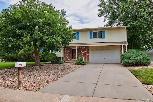 view of front of property with a garage