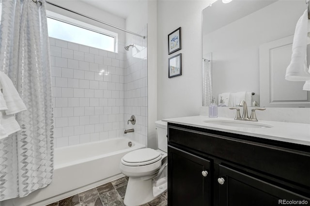 full bath with toilet, shower / bath combination with curtain, and vanity