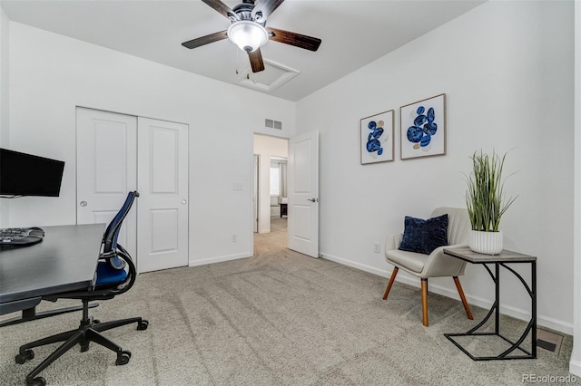 office with light colored carpet, visible vents, and baseboards