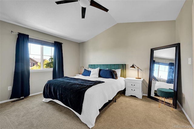 25486 E 4th Pl, Aurora, CO 80018 - carpeted bedroom with multiple windows, lofted ceiling, and a ceiling fan