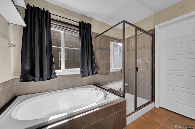 25486 E 4th Pl, Aurora, CO 80018 - full bath with a stall shower, a bath, and tile patterned floors