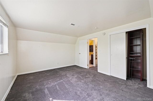 3350 W 94th Ave, Westminster, CO 80031 - unfurnished bedroom featuring carpet floors and lofted ceiling