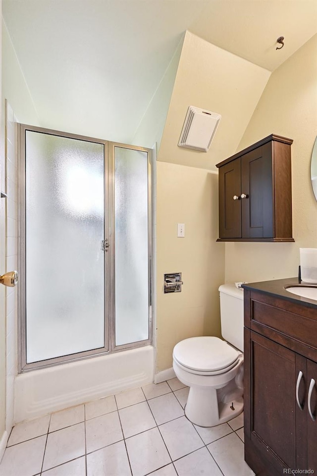 3350 W 94th Ave, Westminster, CO 80031 - bathroom featuring vaulted ceiling, vanity, tile patterned floors, and enclosed tub / shower combo