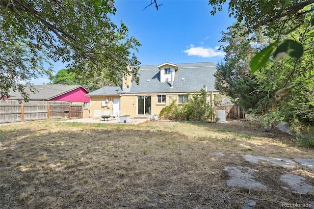 3350 W 94th Ave, Westminster, CO 80031 - rear view of property with a patio area and a fenced backyard