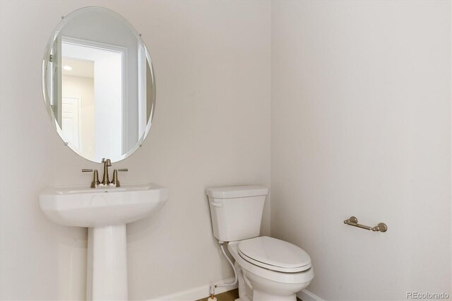 4716 Twelve Oaks Way, Castle Rock, CO 80104 - half bath with baseboards and toilet