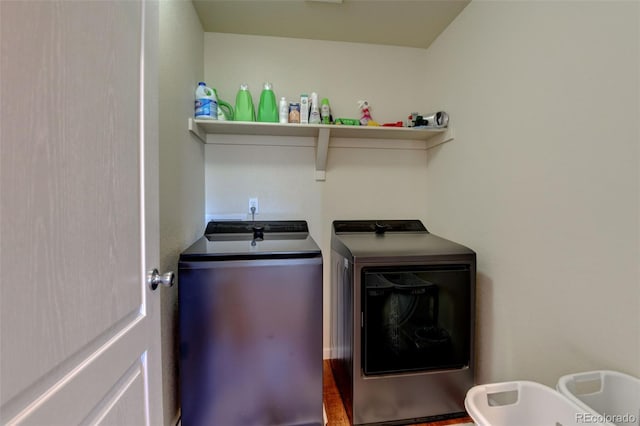 laundry room featuring washing machine and dryer