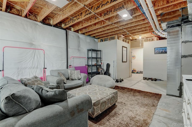 living area featuring concrete flooring