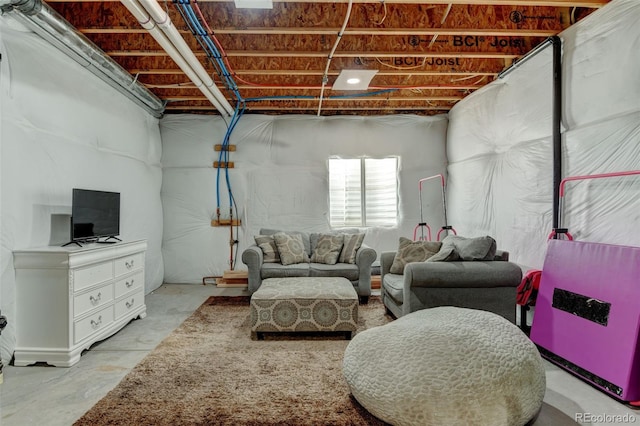 living room with concrete flooring