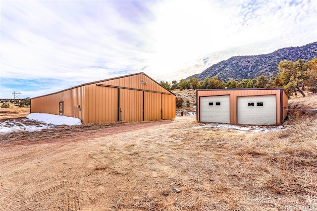 garage featuring a mountain view