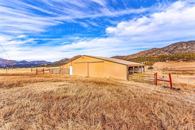 exterior space featuring a mountain view and a rural view