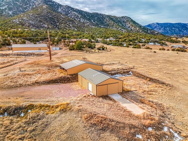 aerial view featuring a mountain view and a rural view