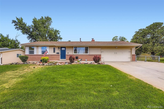 4244 W Monmouth Ave, Littleton, CO 80123 - single story home featuring brick siding, a garage, driveway, and a chimney