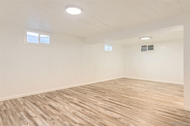 4244 W Monmouth Ave, Littleton, CO 80123 - below grade area with light wood finished floors and healthy amount of natural light