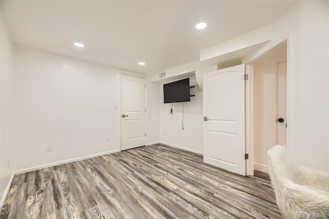 4244 W Monmouth Ave, Littleton, CO 80123 - basement featuring wood finished floors and recessed lighting