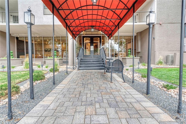 property entrance featuring french doors