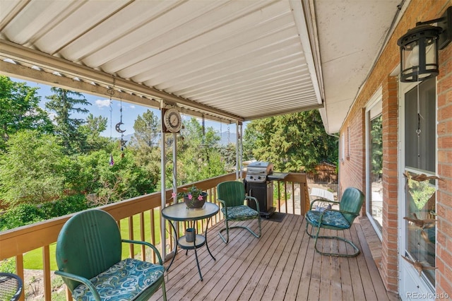 1601 Columbine Pl, Colorado Springs, CO 80907 - deck with a grill and a yard