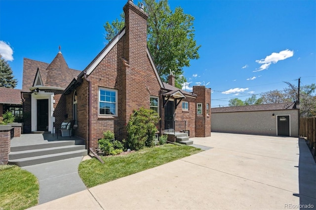 4434 Grove St, Denver, CO 80211 - english style home with brick siding and a chimney