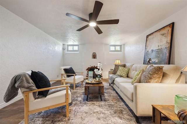 4434 Grove St, Denver, CO 80211 - living area featuring a textured wall, baseboards, healthy amount of natural light, wood finished floors, and ceiling fan