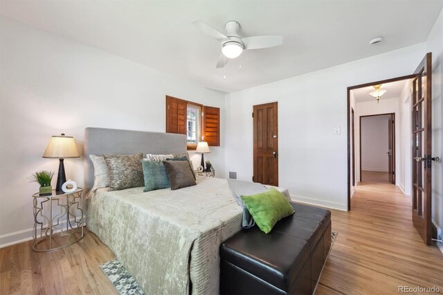 4434 Grove St, Denver, CO 80211 - bedroom with light wood-style floors, baseboards, and a ceiling fan