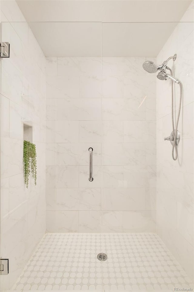 bathroom featuring a stall shower